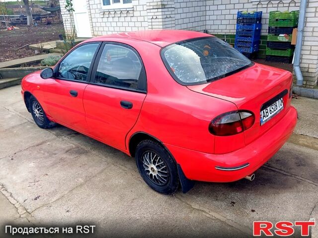 Красный Дэу Ланос, объемом двигателя 1.5 л и пробегом 350 тыс. км за 2000 $, фото 1 на Automoto.ua