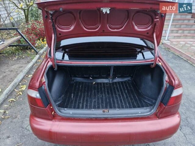 Красный Дэу Ланос, объемом двигателя 1.6 л и пробегом 163 тыс. км за 2650 $, фото 12 на Automoto.ua