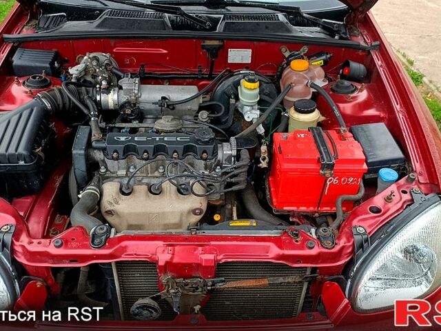 Красный Дэу Ланос, объемом двигателя 1.5 л и пробегом 163 тыс. км за 2200 $, фото 4 на Automoto.ua