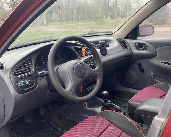 Красный Дэу Ланос, объемом двигателя 1.5 л и пробегом 250 тыс. км за 1450 $, фото 4 на Automoto.ua