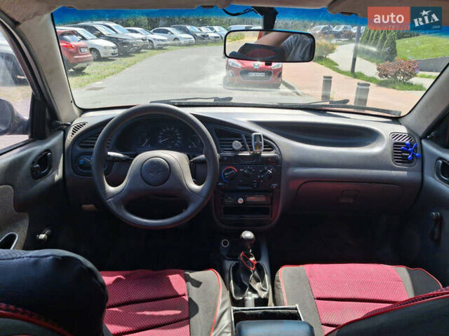 Красный Дэу Ланос, объемом двигателя 1.5 л и пробегом 250 тыс. км за 1150 $, фото 9 на Automoto.ua