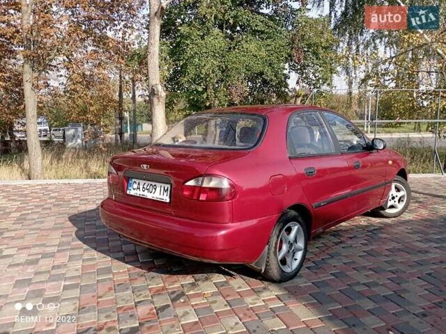 Красный Дэу Ланос, объемом двигателя 1.5 л и пробегом 215 тыс. км за 3000 $, фото 1 на Automoto.ua