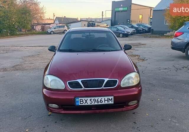 Красный Дэу Ланос, объемом двигателя 1.5 л и пробегом 233 тыс. км за 2100 $, фото 2 на Automoto.ua
