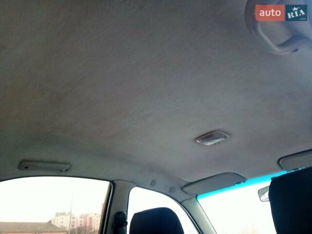 Красный Дэу Ланос, объемом двигателя 1.5 л и пробегом 322 тыс. км за 2300 $, фото 4 на Automoto.ua