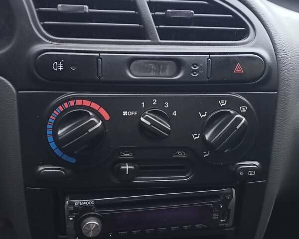 Червоний Деу Ланос, об'ємом двигуна 1.3 л та пробігом 220 тис. км за 1850 $, фото 32 на Automoto.ua