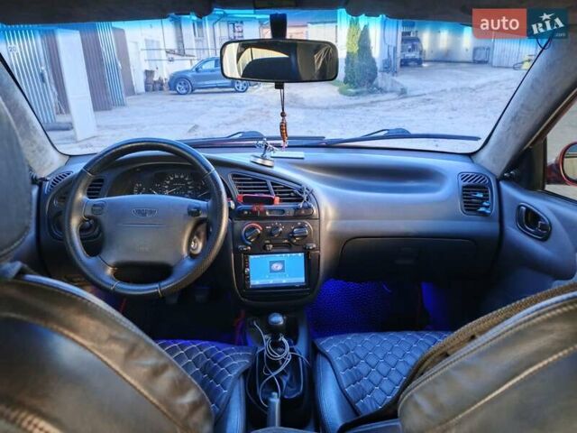 Красный Дэу Ланос, объемом двигателя 1.5 л и пробегом 107 тыс. км за 2900 $, фото 18 на Automoto.ua