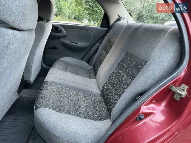 Красный Дэу Ланос, объемом двигателя 1.5 л и пробегом 265 тыс. км за 2300 $, фото 5 на Automoto.ua