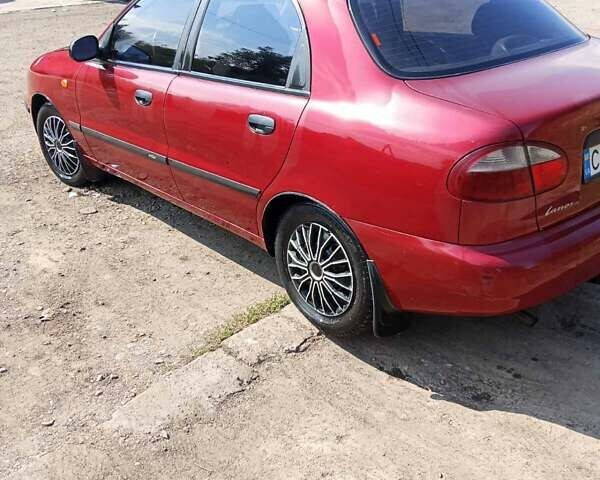 Червоний Деу Ланос, об'ємом двигуна 1.6 л та пробігом 231 тис. км за 1700 $, фото 2 на Automoto.ua