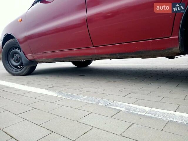 Красный Дэу Ланос, объемом двигателя 1.5 л и пробегом 322 тыс. км за 2300 $, фото 9 на Automoto.ua
