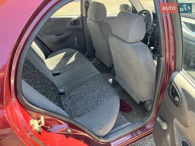 Червоний Деу Ланос, об'ємом двигуна 1.5 л та пробігом 207 тис. км за 2500 $, фото 9 на Automoto.ua