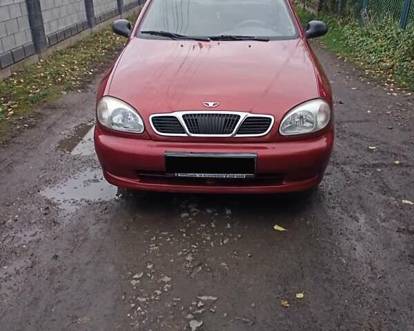 Червоний Деу Ланос, об'ємом двигуна 1.3 л та пробігом 220 тис. км за 1850 $, фото 5 на Automoto.ua