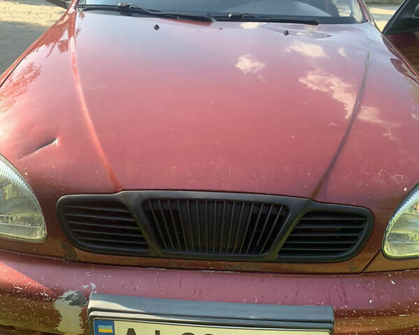 Красный Дэу Ланос, объемом двигателя 1.5 л и пробегом 348 тыс. км за 2000 $, фото 1 на Automoto.ua