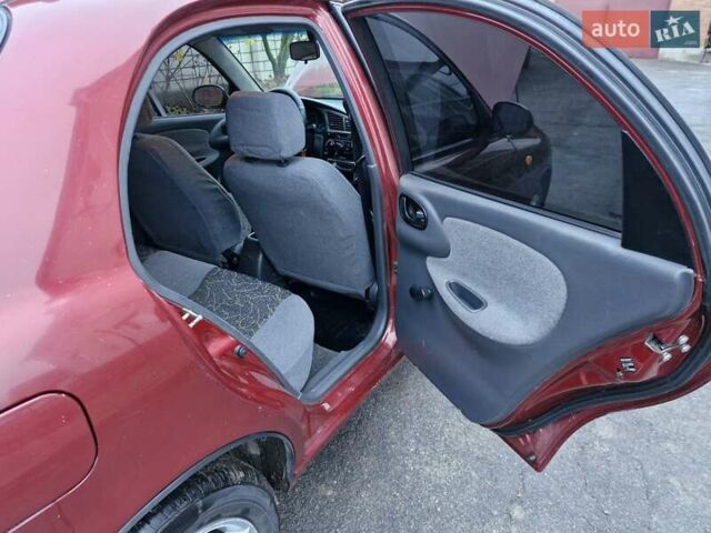 Красный Дэу Ланос, объемом двигателя 1.6 л и пробегом 163 тыс. км за 2650 $, фото 7 на Automoto.ua