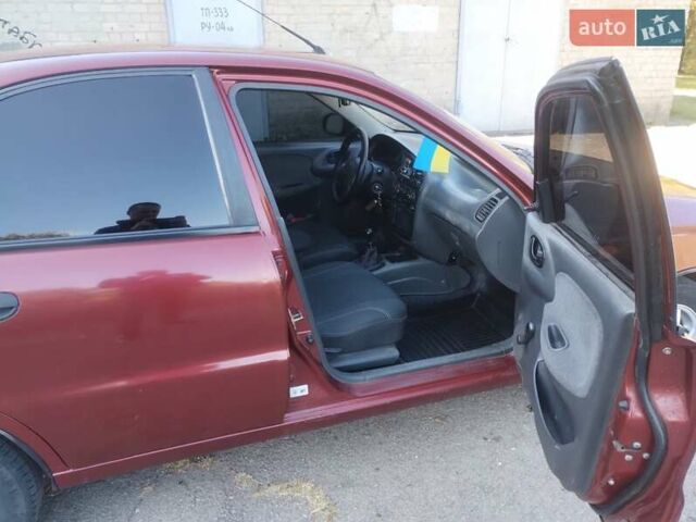 Красный Дэу Ланос, объемом двигателя 1.5 л и пробегом 322 тыс. км за 2200 $, фото 1 на Automoto.ua