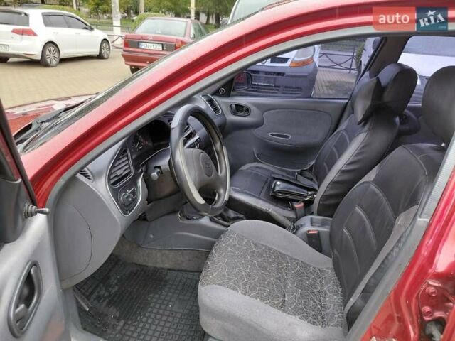 Красный Дэу Ланос, объемом двигателя 1.5 л и пробегом 183 тыс. км за 2850 $, фото 21 на Automoto.ua
