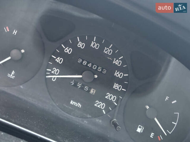 Красный Дэу Ланос, объемом двигателя 1.3 л и пробегом 283 тыс. км за 1500 $, фото 4 на Automoto.ua