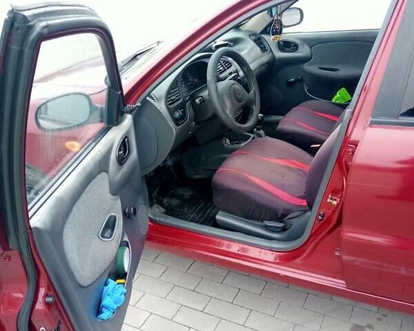 Красный Дэу Ланос, объемом двигателя 1.5 л и пробегом 322 тыс. км за 2300 $, фото 7 на Automoto.ua