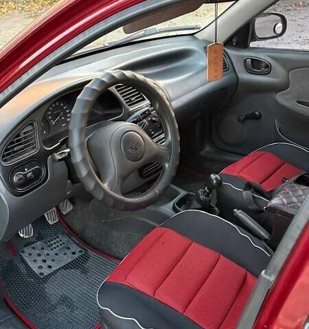 Дэу Ланос 2006 в Южноукраинске на Automoto.ua Красный Дэу Ланос, объемом двигателя 1.5 л и пробегом 98 тыс. км за 2900 $, фото 8 на Automoto.ua