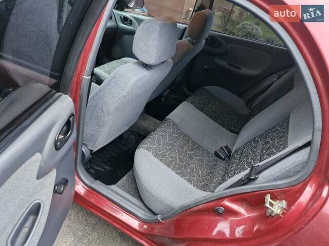 Красный Дэу Ланос, объемом двигателя 1.6 л и пробегом 163 тыс. км за 2650 $, фото 22 на Automoto.ua