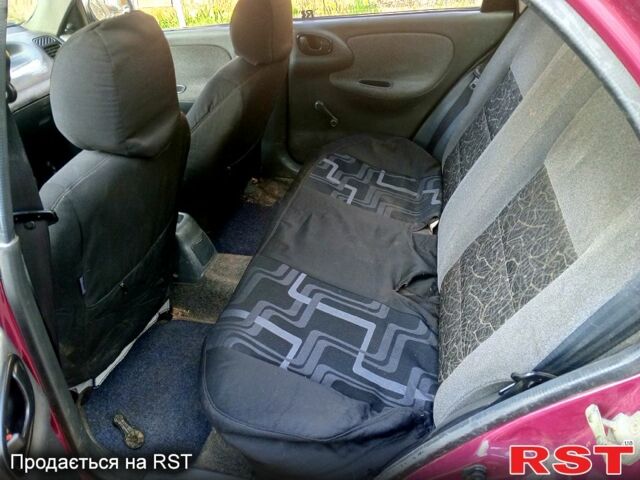 Червоний Деу Ланос, об'ємом двигуна 1.5 л та пробігом 150 тис. км за 1550 $, фото 7 на Automoto.ua