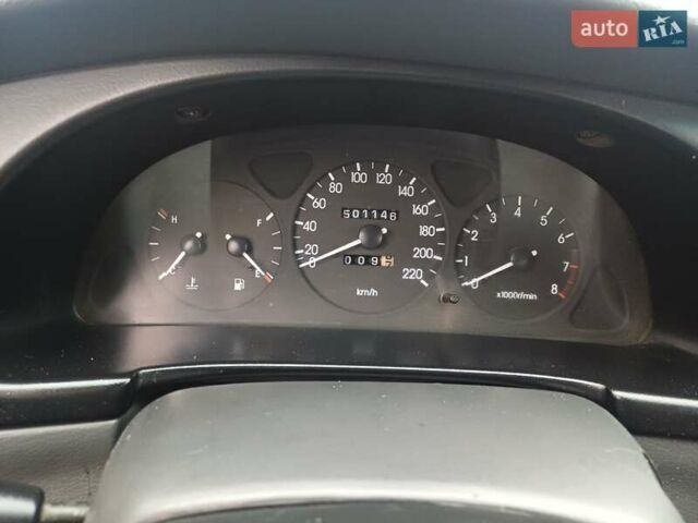 Красный Дэу Ланос, объемом двигателя 1.5 л и пробегом 501 тыс. км за 2400 $, фото 2 на Automoto.ua