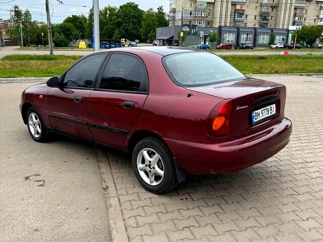Красный Дэу Ланос, объемом двигателя 1.5 л и пробегом 310 тыс. км за 1950 $, фото 2 на Automoto.ua