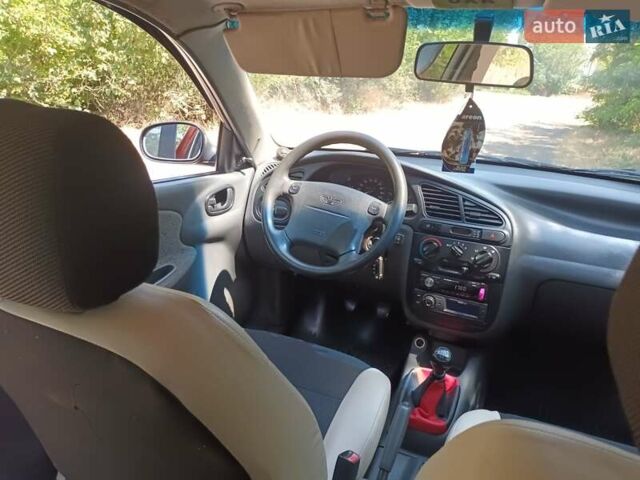 Красный Дэу Ланос, объемом двигателя 1.6 л и пробегом 304 тыс. км за 2900 $, фото 10 на Automoto.ua