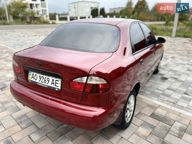 Красный Дэу Ланос, объемом двигателя 1.5 л и пробегом 250 тыс. км за 1950 $, фото 9 на Automoto.ua