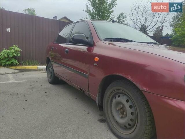 Красный Дэу Ланос, объемом двигателя 1.6 л и пробегом 186 тыс. км за 2200 $, фото 19 на Automoto.ua
