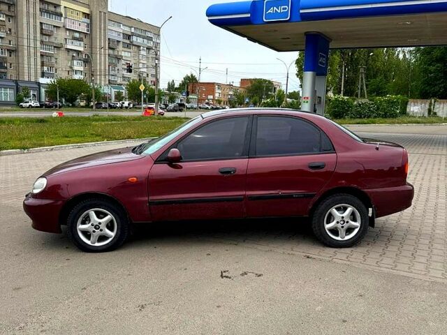 Красный Дэу Ланос, объемом двигателя 1.5 л и пробегом 310 тыс. км за 1950 $, фото 1 на Automoto.ua