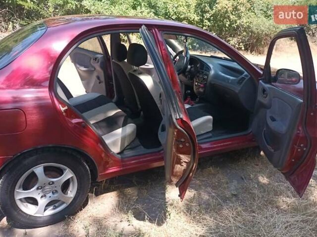 Красный Дэу Ланос, объемом двигателя 1.6 л и пробегом 304 тыс. км за 2900 $, фото 8 на Automoto.ua