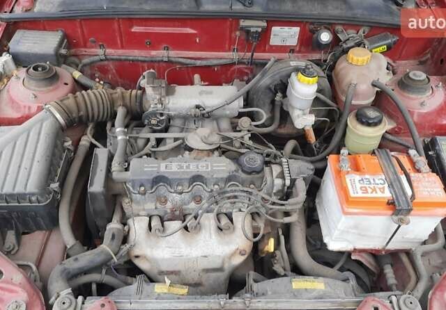 Червоний Деу Ланос, об'ємом двигуна 1.5 л та пробігом 151 тис. км за 1350 $, фото 7 на Automoto.ua