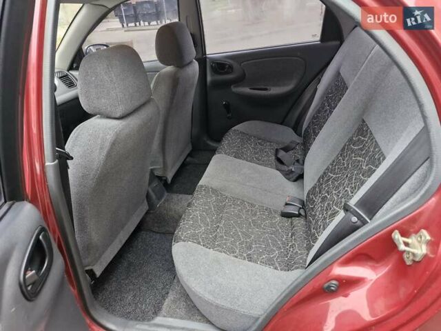 Красный Дэу Ланос, объемом двигателя 1.5 л и пробегом 146 тыс. км за 2300 $, фото 6 на Automoto.ua