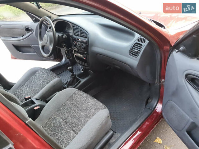 Красный Дэу Ланос, объемом двигателя 1.5 л и пробегом 270 тыс. км за 2450 $, фото 8 на Automoto.ua
