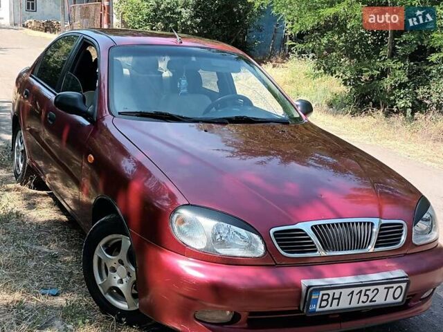 Красный Дэу Ланос, объемом двигателя 1.6 л и пробегом 304 тыс. км за 2900 $, фото 3 на Automoto.ua