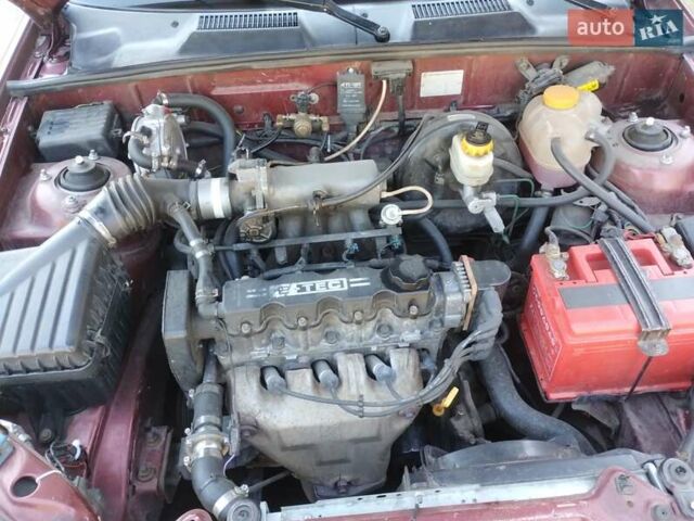 Красный Дэу Ланос, объемом двигателя 1.5 л и пробегом 322 тыс. км за 2200 $, фото 2 на Automoto.ua