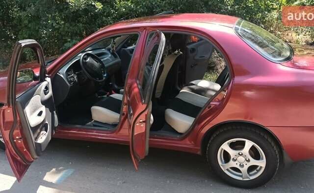 Красный Дэу Ланос, объемом двигателя 1.6 л и пробегом 304 тыс. км за 2900 $, фото 5 на Automoto.ua