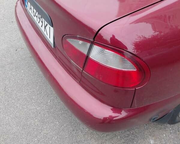 Красный Дэу Ланос, объемом двигателя 1.5 л и пробегом 309 тыс. км за 2200 $, фото 13 на Automoto.ua