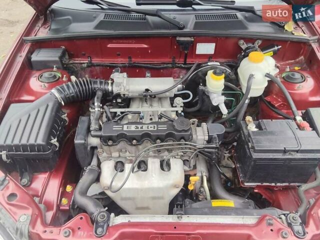 Красный Дэу Ланос, объемом двигателя 1.5 л и пробегом 152 тыс. км за 3150 $, фото 9 на Automoto.ua