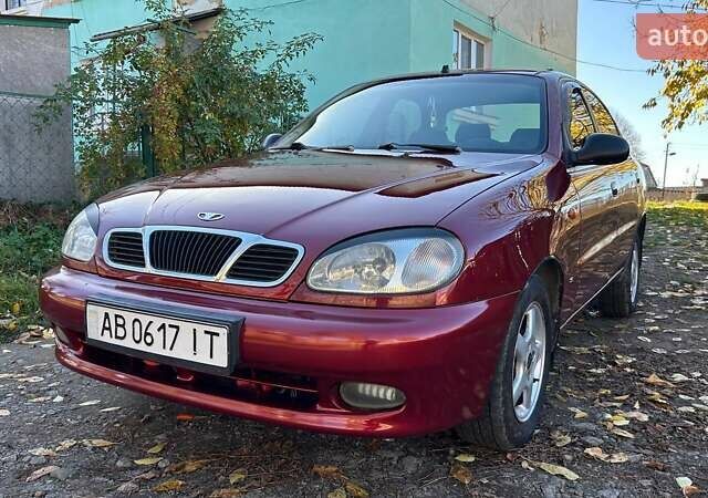 Красный Дэу Ланос, объемом двигателя 1.6 л и пробегом 216 тыс. км за 1900 $, фото 1 на Automoto.ua