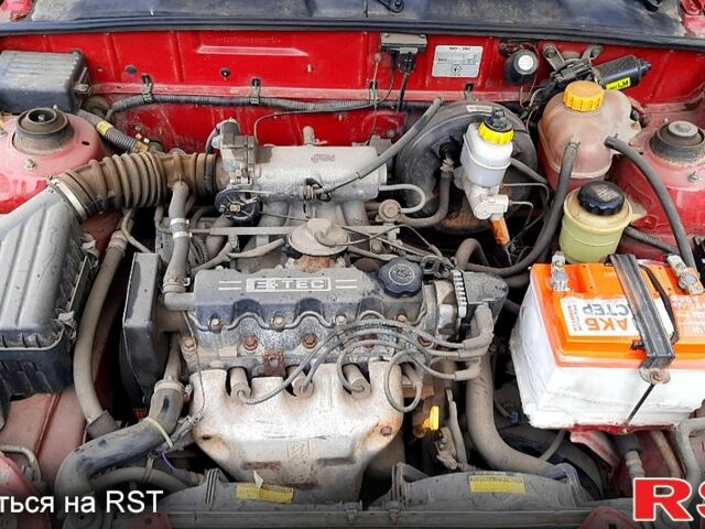 Красный Дэу Ланос, объемом двигателя 1.5 л и пробегом 151 тыс. км за 1499 $, фото 8 на Automoto.ua