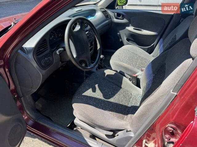 Червоний Деу Ланос, об'ємом двигуна 1.5 л та пробігом 207 тис. км за 2500 $, фото 8 на Automoto.ua