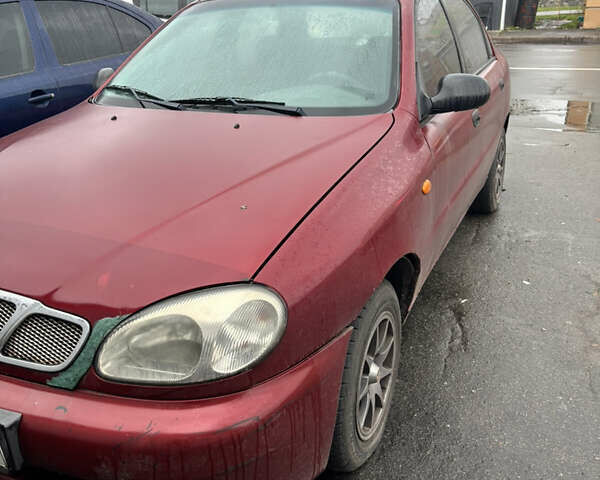 Красный Дэу Ланос, объемом двигателя 1.3 л и пробегом 283 тыс. км за 1500 $, фото 2 на Automoto.ua