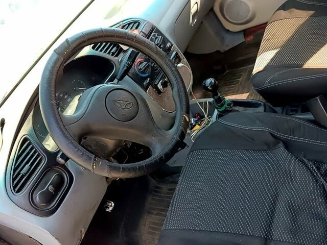 Червоний Деу Ланос, об'ємом двигуна 1.5 л та пробігом 150 тис. км за 1300 $, фото 4 на Automoto.ua