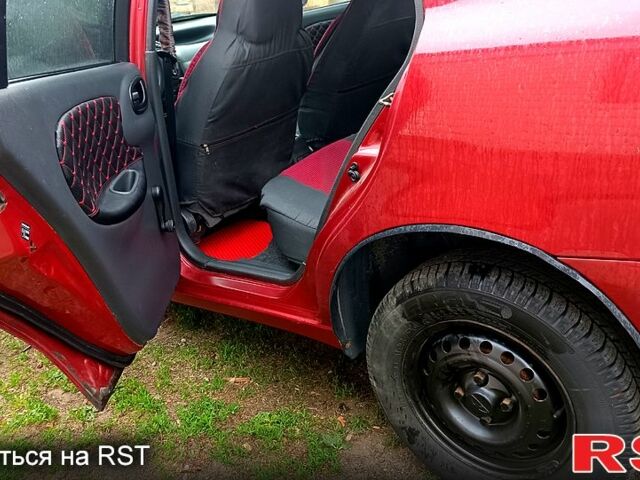 Красный Дэу Ланос, объемом двигателя 1.5 л и пробегом 163 тыс. км за 2200 $, фото 8 на Automoto.ua