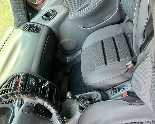 Красный Дэу Ланос, объемом двигателя 1.5 л и пробегом 158 тыс. км за 2500 $, фото 10 на Automoto.ua