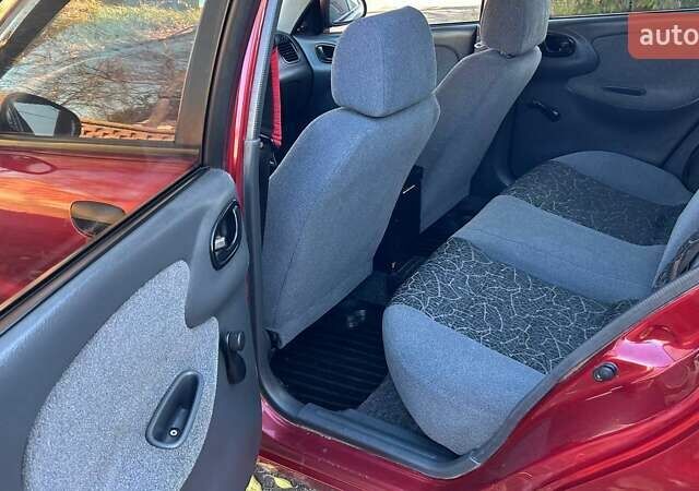 Красный Дэу Ланос, объемом двигателя 1.6 л и пробегом 216 тыс. км за 1900 $, фото 14 на Automoto.ua