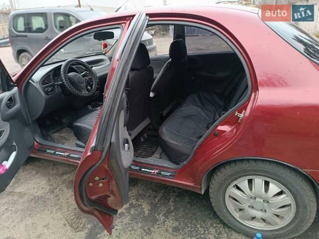Красный Дэу Ланос, объемом двигателя 1.5 л и пробегом 224 тыс. км за 2700 $, фото 1 на Automoto.ua