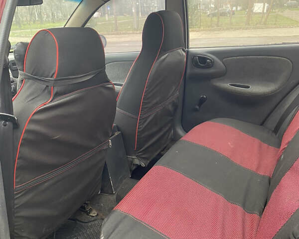 Красный Дэу Ланос, объемом двигателя 1.5 л и пробегом 250 тыс. км за 1450 $, фото 5 на Automoto.ua