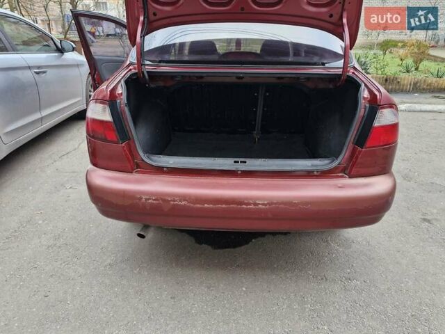 Красный Дэу Ланос, объемом двигателя 1.5 л и пробегом 146 тыс. км за 2300 $, фото 9 на Automoto.ua